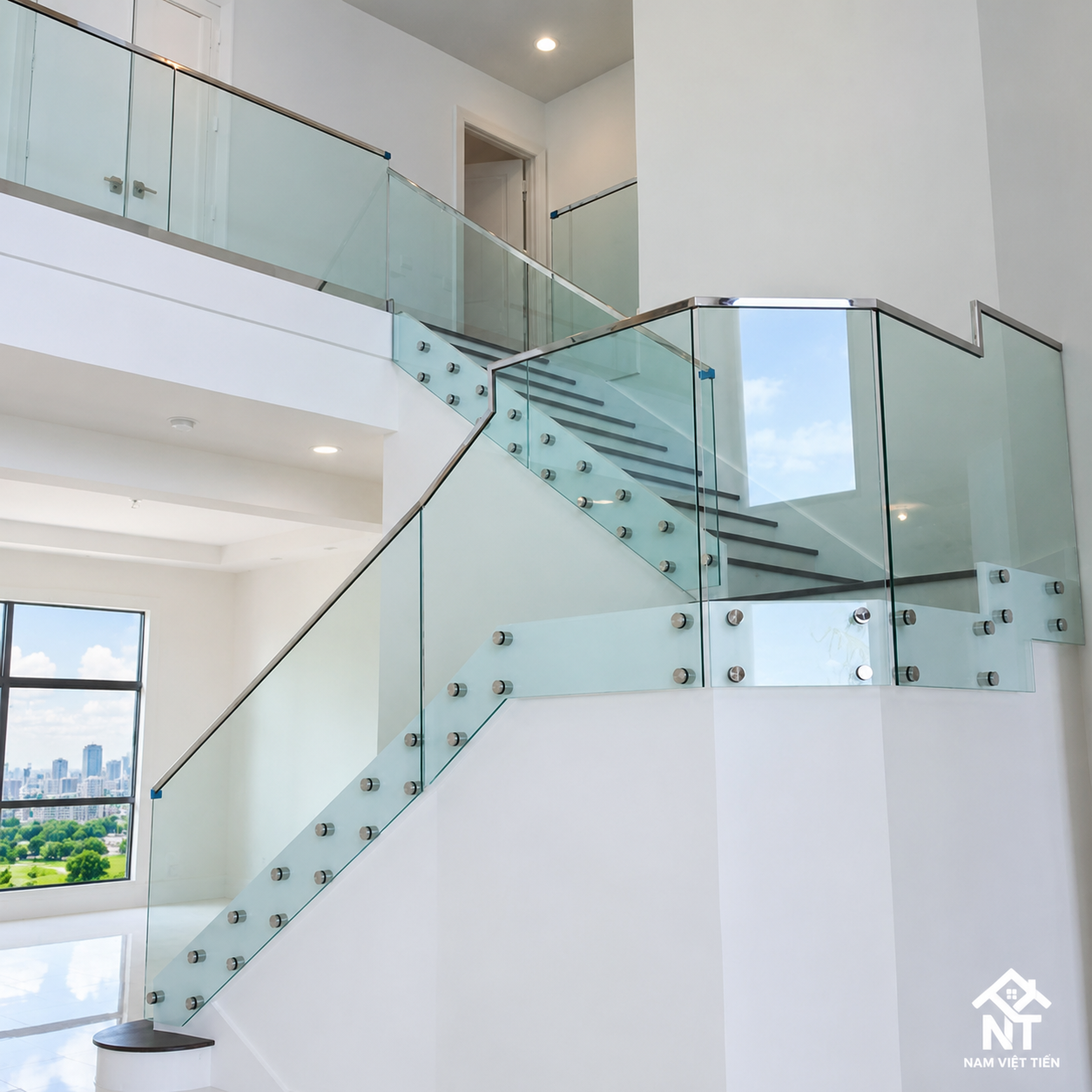 tay vịn inox hoàn thiện cầu thang kính