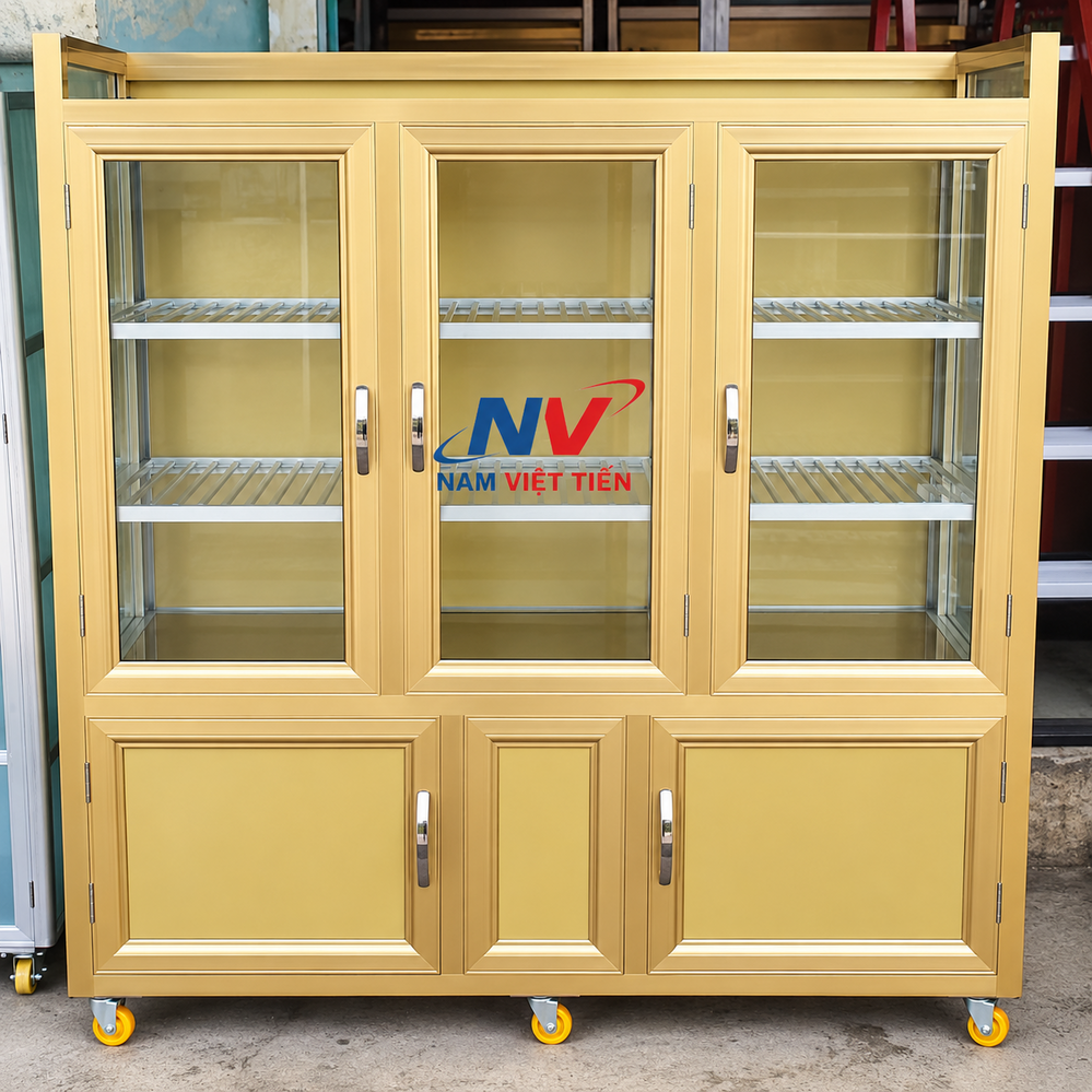 Tủ chén nhôm kính màu vàng ba cánh cửa
